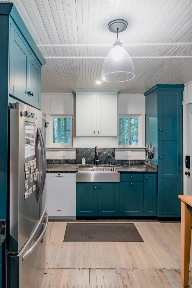 Inspiration for a small farmhouse galley light wood floor, beige floor and wood ceiling eat-in kitchen remodel in Other with an undermount sink, shaker cabinets, green cabinets, soapstone countertops, black backsplash, no island and black countertops