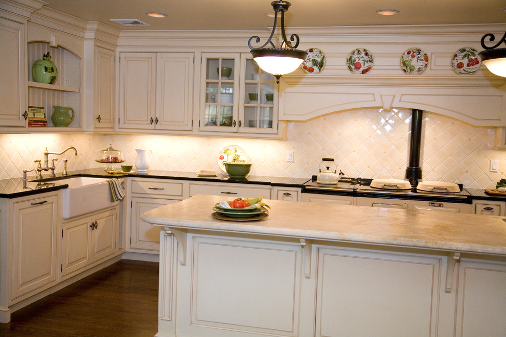 Kitchen - traditional kitchen idea in New York with a farmhouse sink, beaded inset cabinets, white cabinets and granite countertops