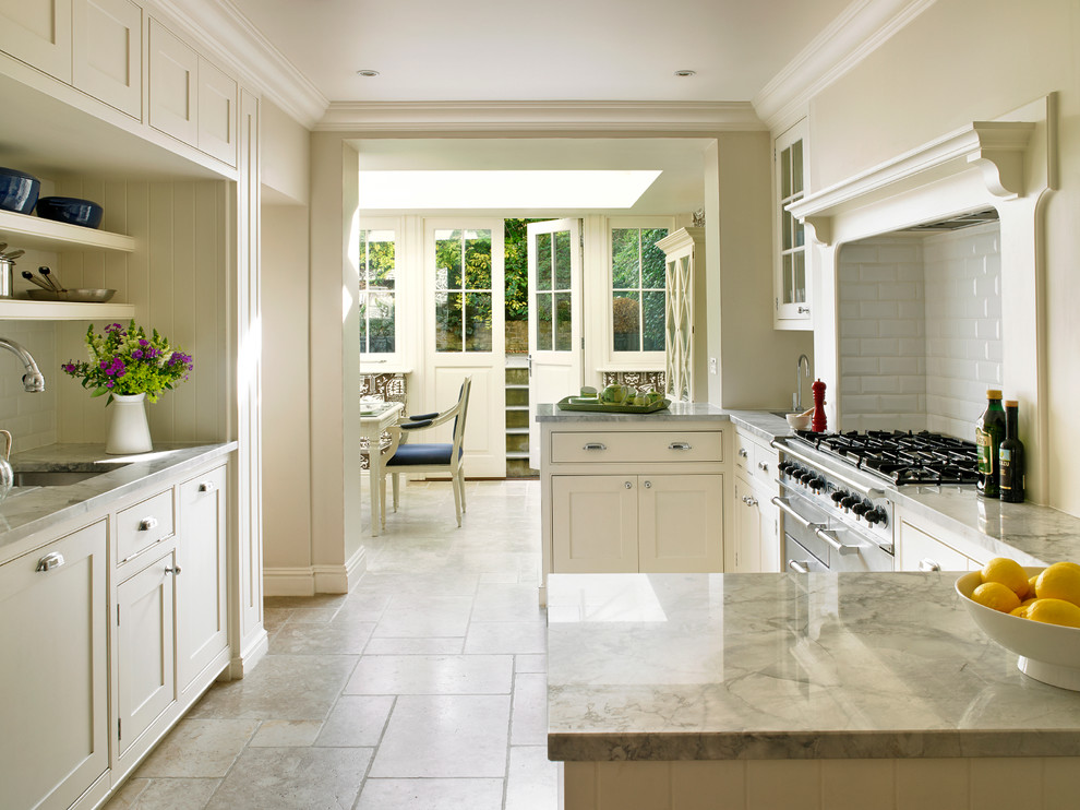 Photo of a medium sized classic galley kitchen in London.