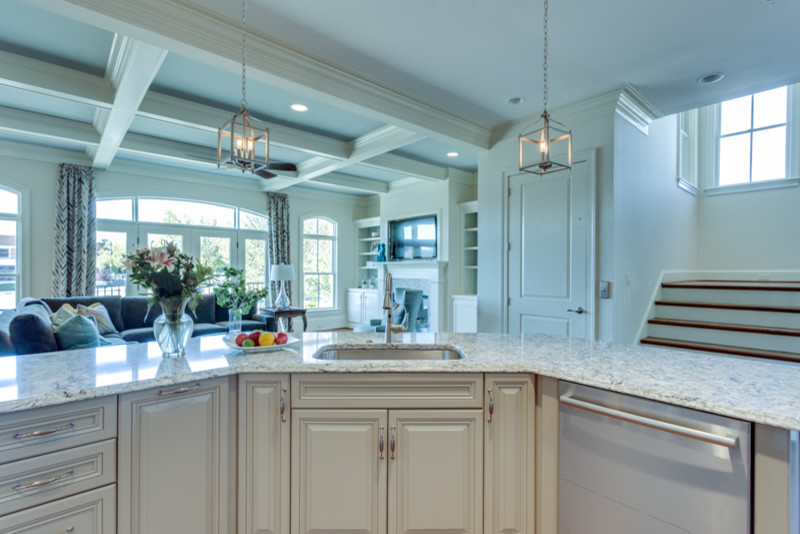 Inspiration for a traditional kitchen/diner in DC Metro with raised-panel cabinets and white cabinets.
