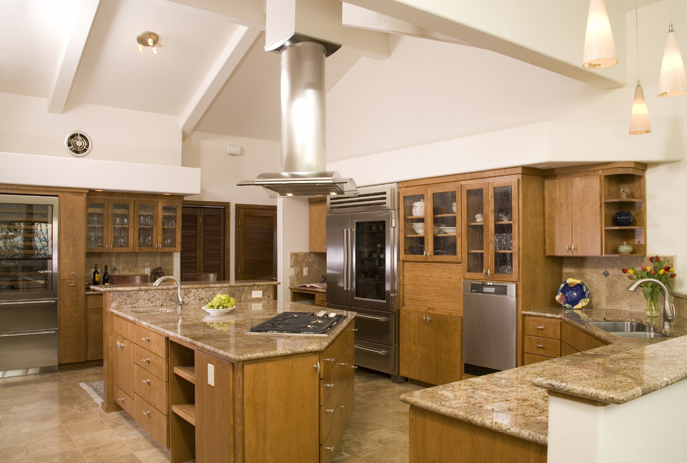 Inspiration for a timeless kitchen remodel in Denver with glass-front cabinets, stainless steel appliances, a double-bowl sink, medium tone wood cabinets and granite countertops