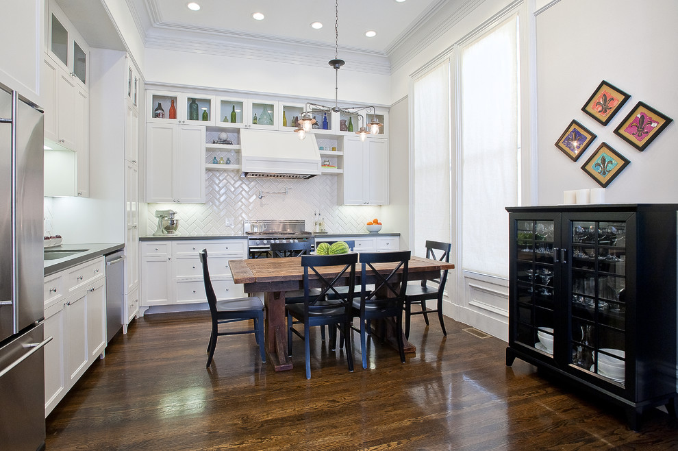 Photo of a traditional kitchen in San Francisco with glass-front cabinets.