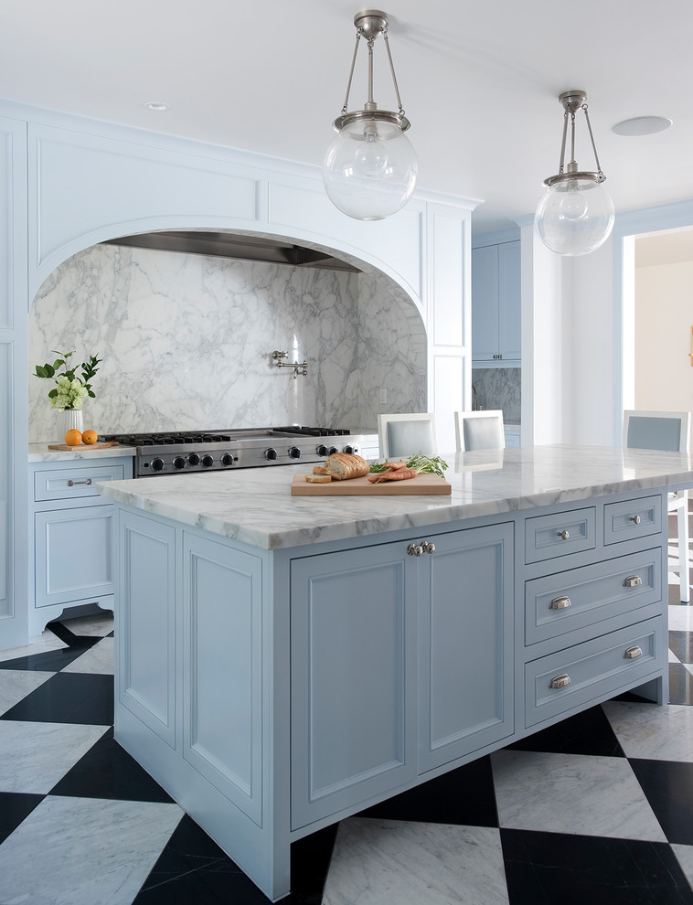 Traditional l-shaped kitchen in San Francisco with recessed-panel cabinets, blue cabinets, grey splashback, stainless steel appliances, an island and multi-coloured floors.