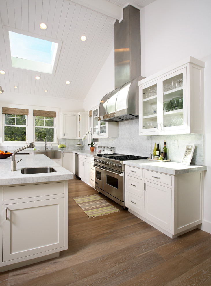 Design ideas for a classic kitchen in San Francisco with glass-front cabinets and stainless steel appliances.