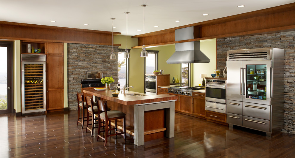 Inspiration for a timeless kitchen remodel in Other with medium tone wood cabinets