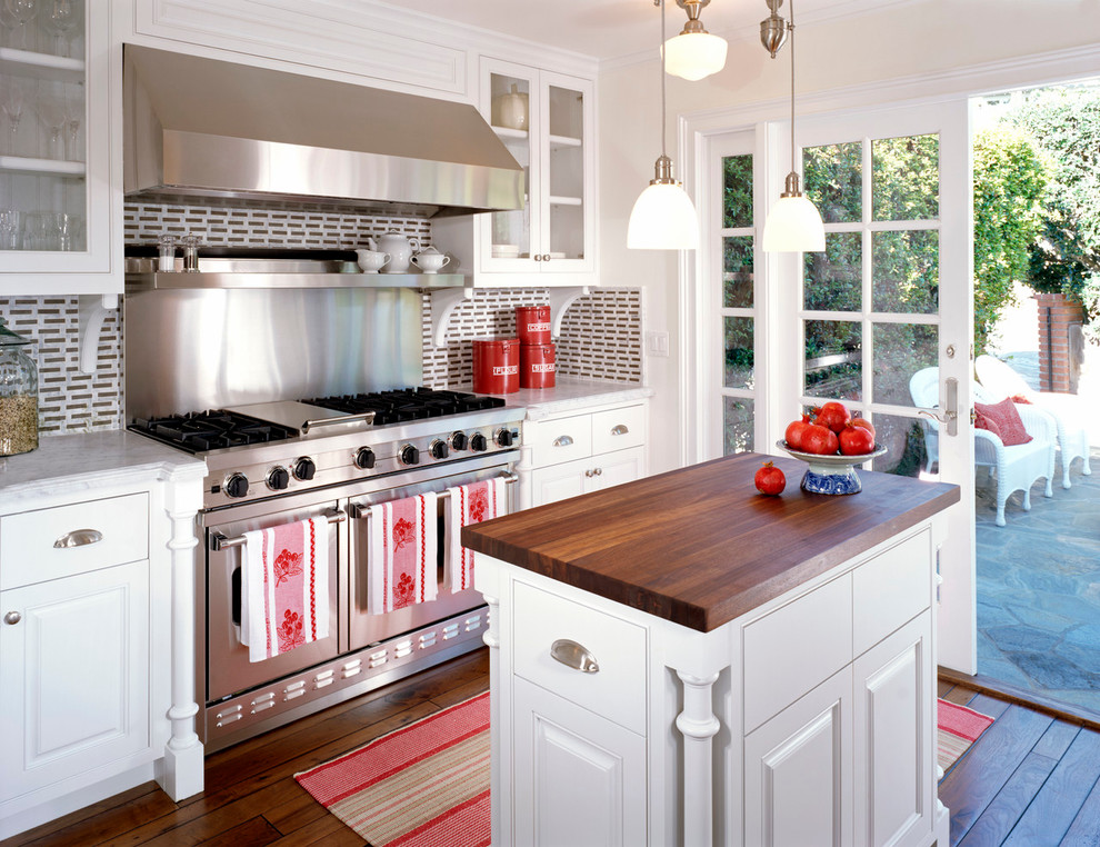 Inspiration for a traditional kitchen in New York with wood worktops.