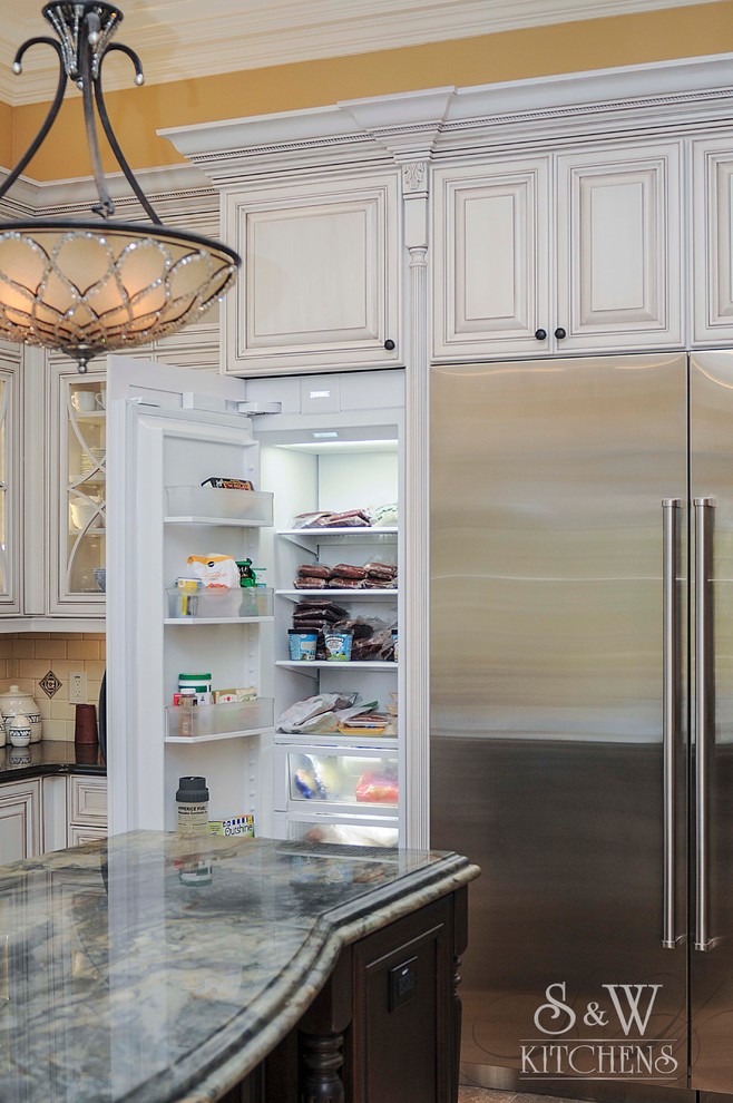 Design ideas for an expansive classic kitchen pantry in Tampa with a submerged sink, open cabinets, white cabinets, engineered stone countertops, black splashback, glass sheet splashback, stainless steel appliances, marble flooring and an island.