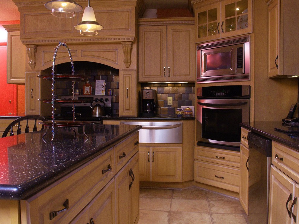 Traditional Maple and Silestone Kitchen with Range Hood in
