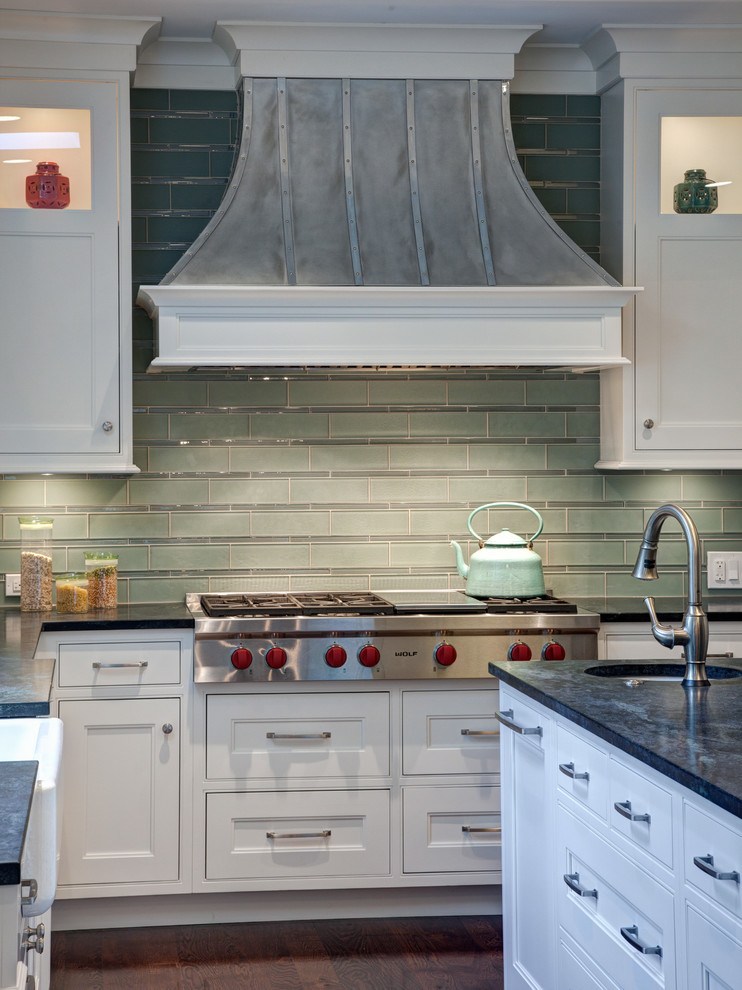 Inspiration for a transitional kitchen remodel in Chicago with white cabinets and soapstone countertops