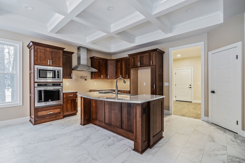 Large transitional l-shaped ceramic tile and multicolored floor eat-in kitchen photo in New York with an undermount sink, shaker cabinets, medium tone wood cabinets, quartz countertops, stainless steel appliances, an island and multicolored countertops