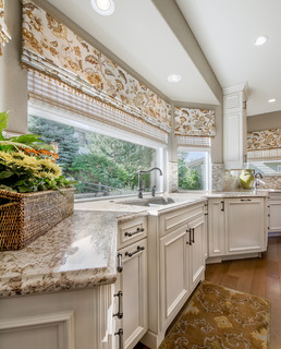 Gorgeous two story kitchen, granite countertops, pendant lighting, blue  mosaic backsplash tile, g…