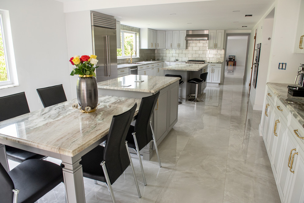 Transitional Kitchen Done in a 2 Tone Color With Integrated Dining ...