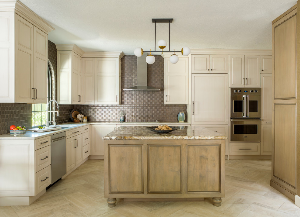 Eat-in kitchen - transitional l-shaped porcelain tile and beige floor eat-in kitchen idea in Other with an undermount sink, raised-panel cabinets, beige cabinets, metallic backsplash, metal backsplash, paneled appliances, an island, multicolored countertops and granite countertops