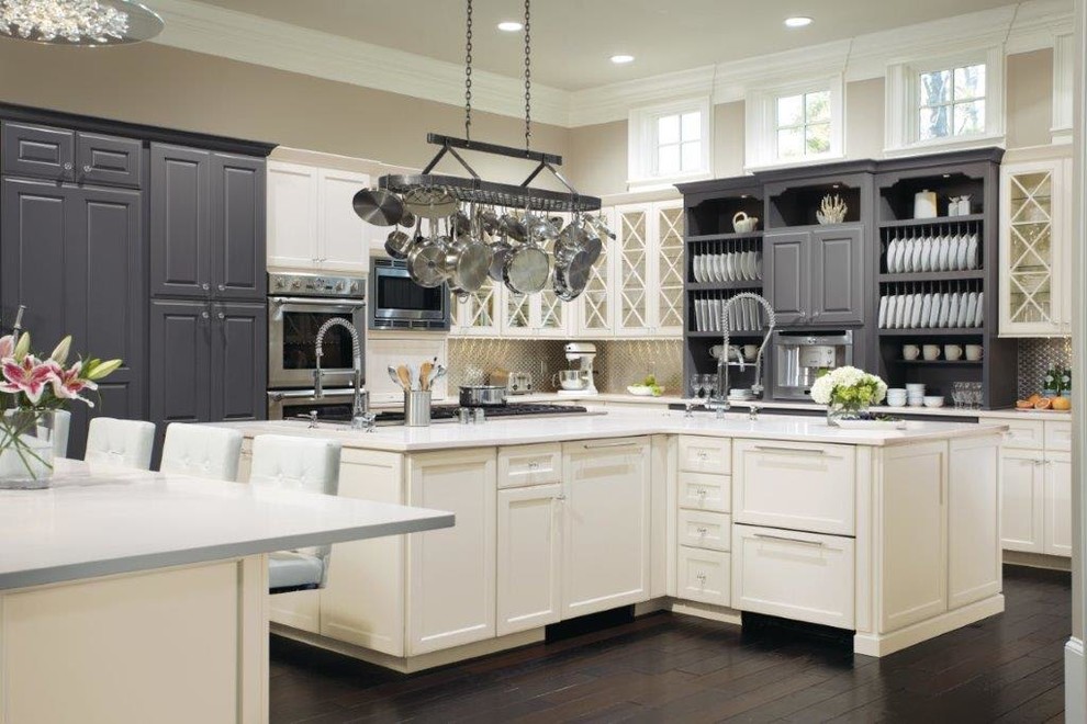 Eat-in kitchen - large farmhouse l-shaped dark wood floor and brown floor eat-in kitchen idea in Atlanta with shaker cabinets, white cabinets, quartz countertops, metallic backsplash, metal backsplash, stainless steel appliances, no island and white countertops
