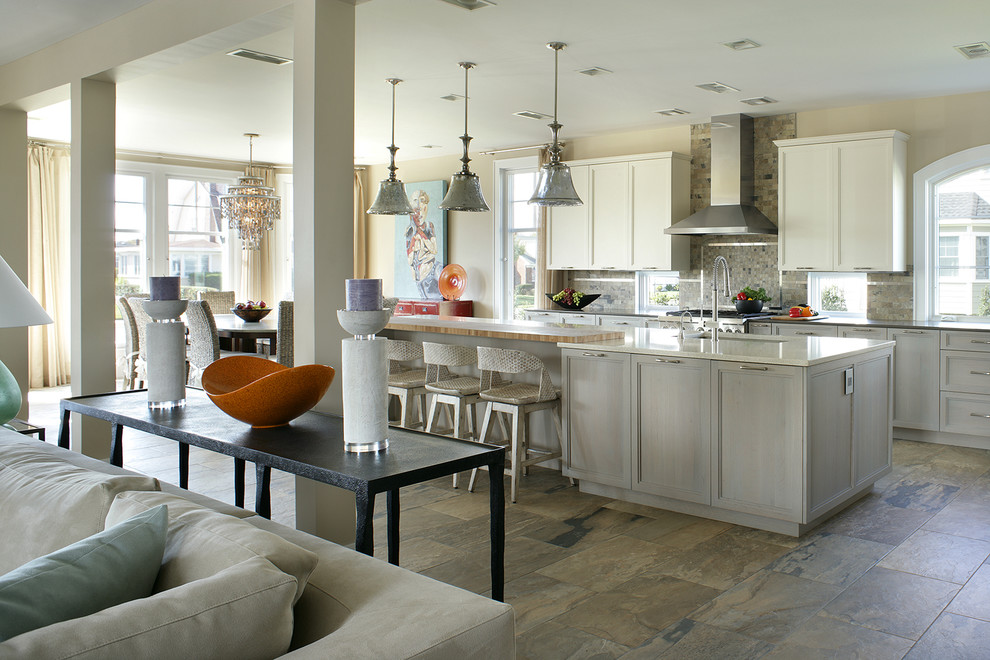 Example of a large transitional l-shaped porcelain tile eat-in kitchen design in Other with recessed-panel cabinets, light wood cabinets, quartz countertops, multicolored backsplash, stainless steel appliances, an undermount sink and slate backsplash