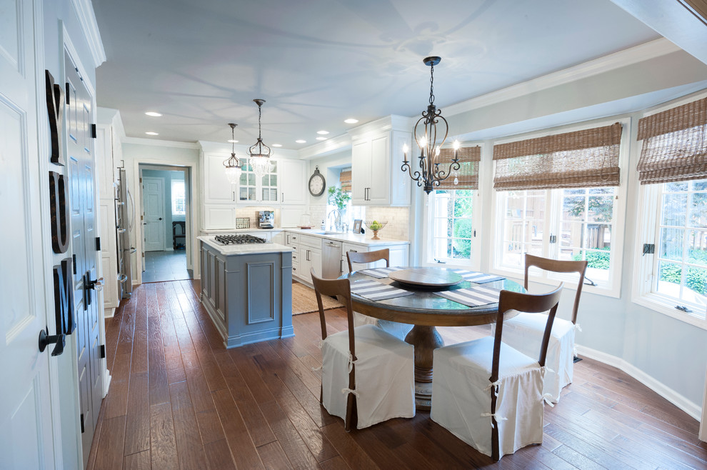 Transitional kitchen with white perimeter & gray island