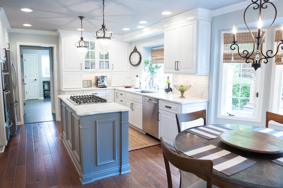 Picture of Transitional white kitchen with gray island and wood flooring ...