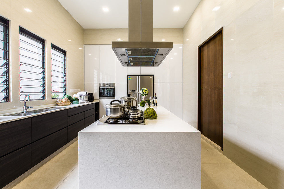 Photo of a large contemporary l-shaped enclosed kitchen in Singapore with white cabinets, quartz worktops, an island, flat-panel cabinets and stainless steel appliances.