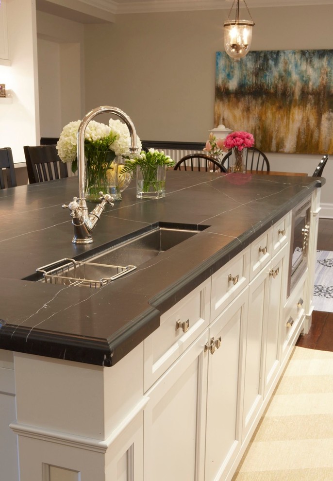 Elegant eat-in kitchen photo in Toronto with an undermount sink, recessed-panel cabinets and white cabinets