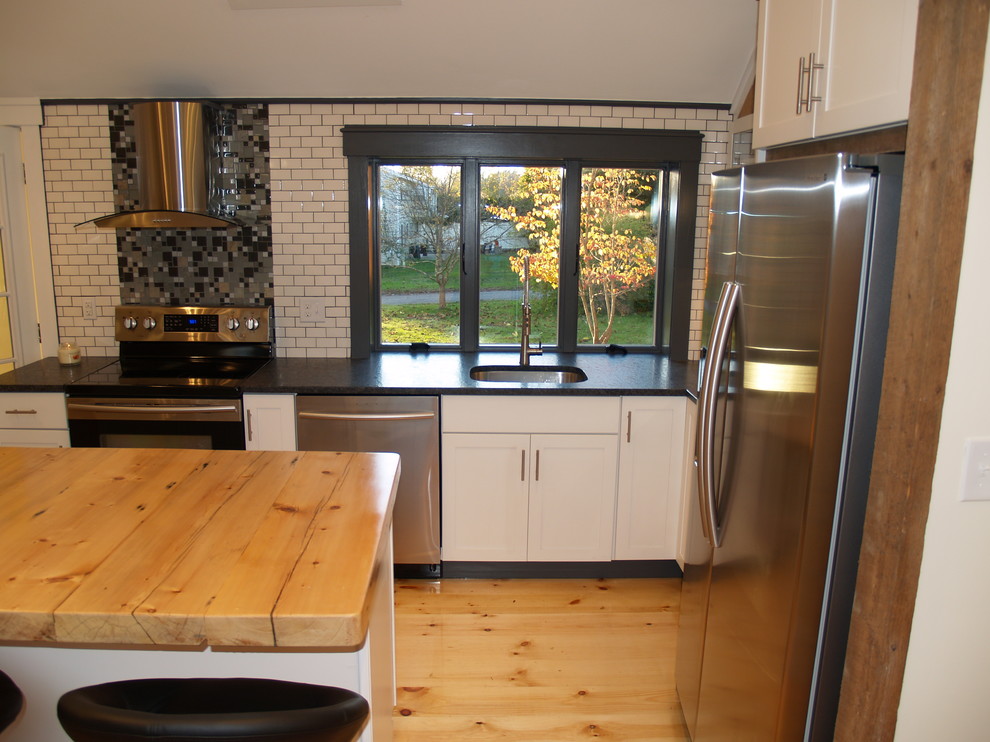 This is an example of a farmhouse kitchen in Boston.