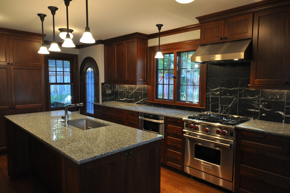 Example of a classic kitchen design in Seattle with stainless steel appliances