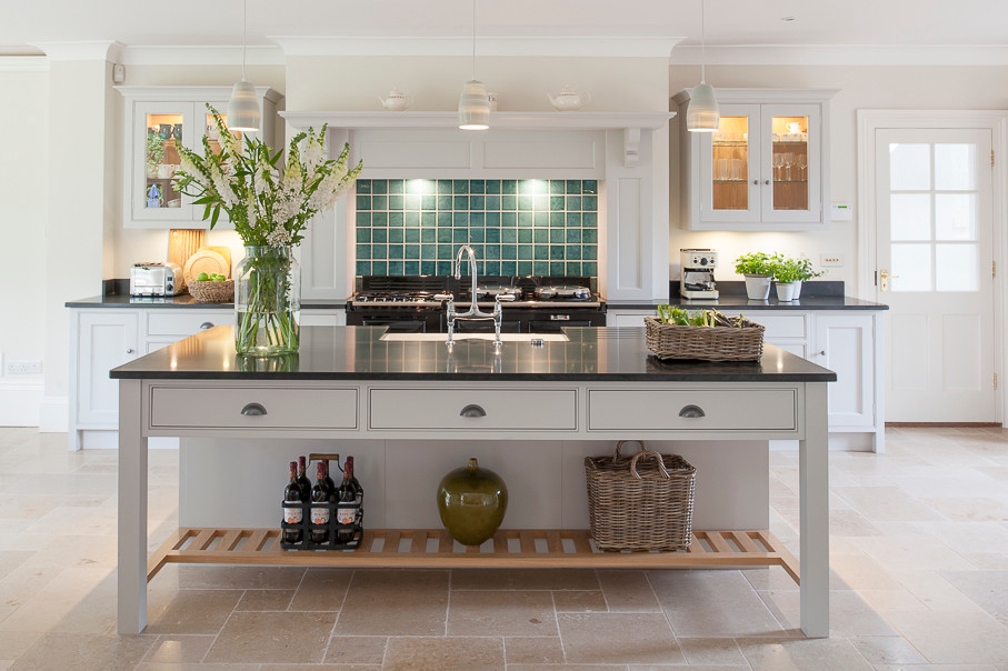 Design ideas for a large classic open plan kitchen in Kent with a double-bowl sink, beaded cabinets, grey cabinets, granite worktops, blue splashback, ceramic splashback, limestone flooring and an island.