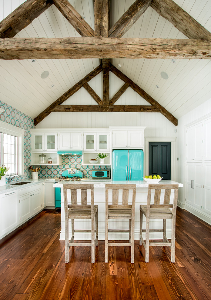 Design ideas for a small farmhouse l-shaped open plan kitchen in St Louis with white cabinets, coloured appliances, an island, a submerged sink, beaded cabinets, engineered stone countertops, multi-coloured splashback, mosaic tiled splashback and medium hardwood flooring.