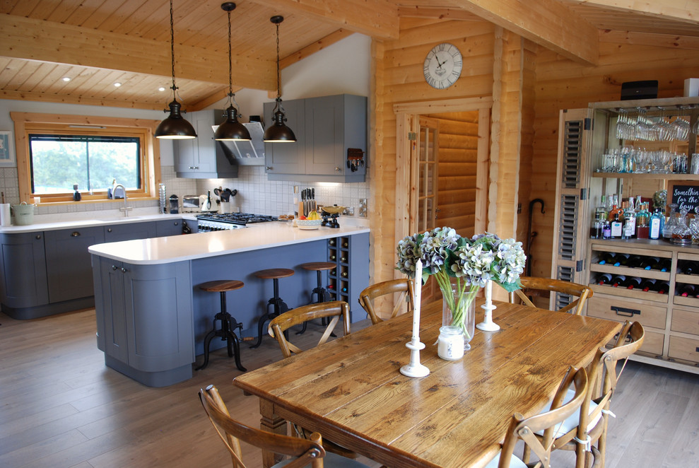 Scandinavian kitchen in Surrey with white splashback.