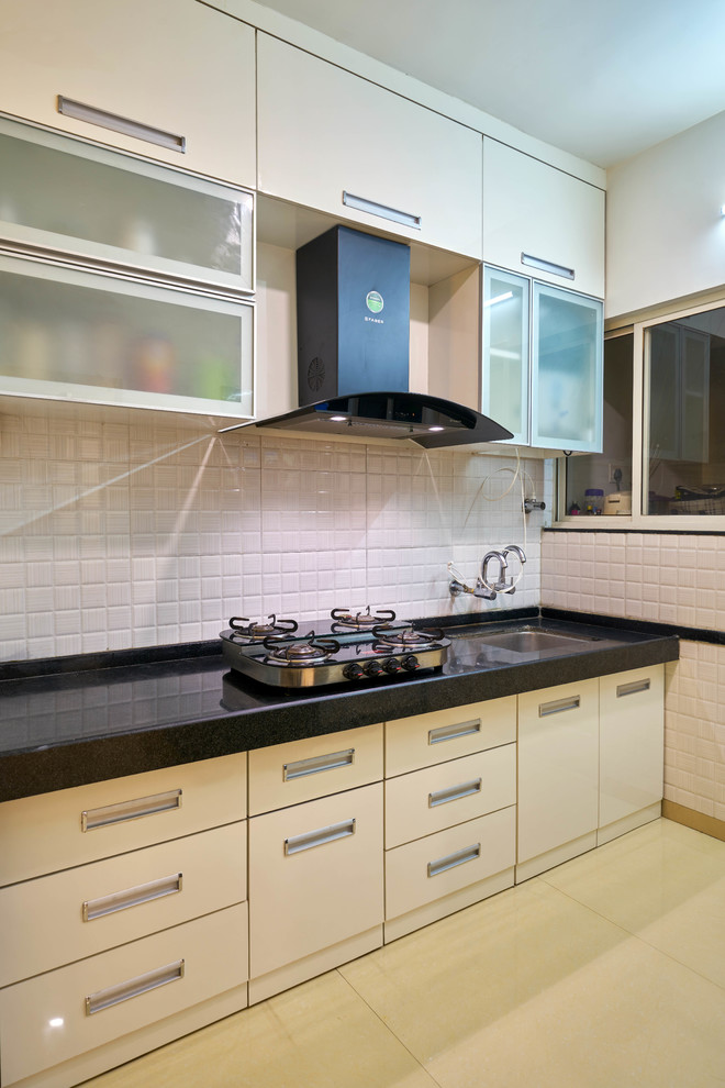 Example of an asian kitchen design in Other