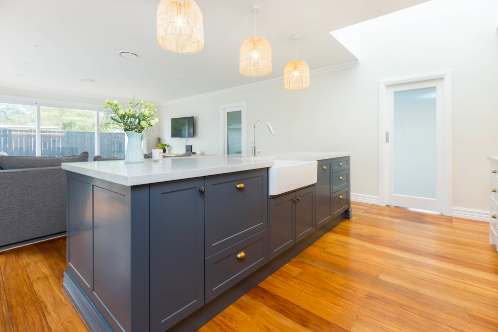 Two Tone elegance with shaker doors and Caesarstone top Kitchen