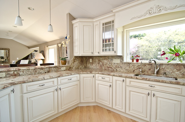 bathroom with typhoon bordeaux granite and white sink