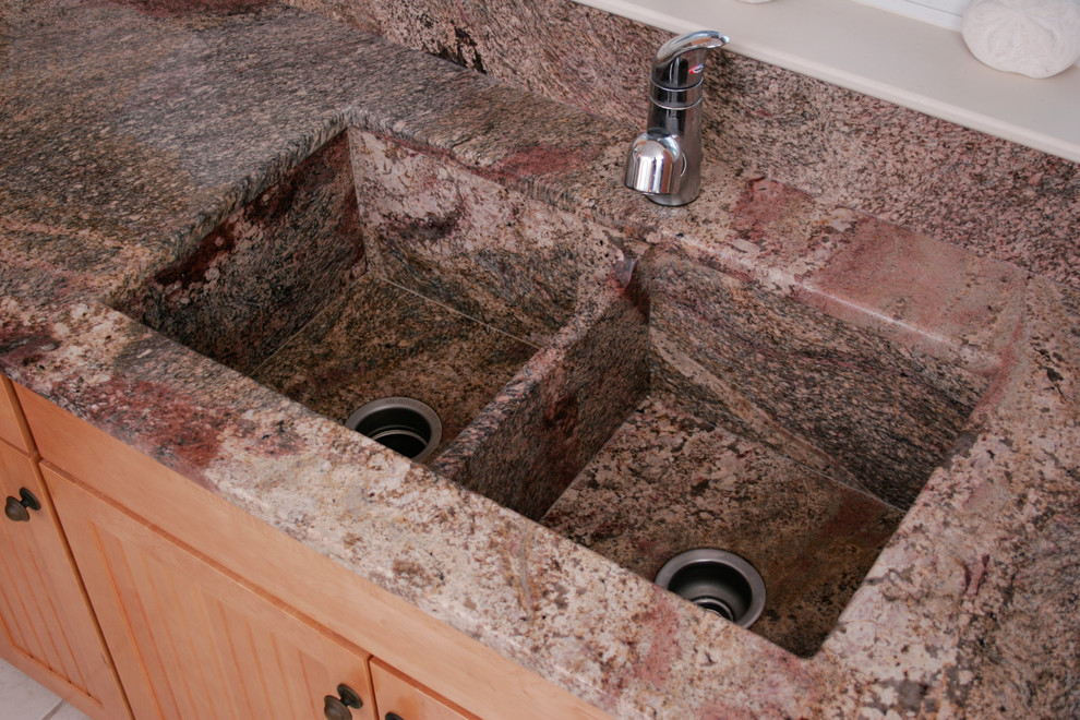 Kitchen - craftsman kitchen idea in Portland Maine with an undermount sink and granite countertops