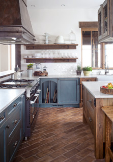 INTERIORS とじまと on X: YOU MAKE ME FEEL SO BLUE— Blue kitchen cabinet with  matching backsplash and terracotta tiles.  / X