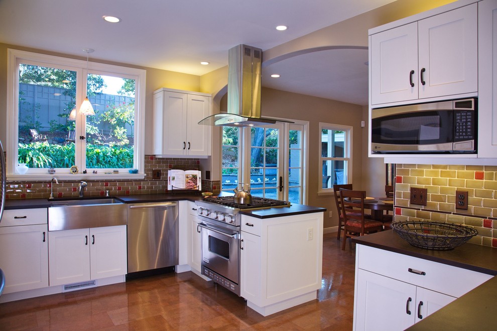 Trendy kitchen photo in San Francisco with stainless steel appliances and a farmhouse sink