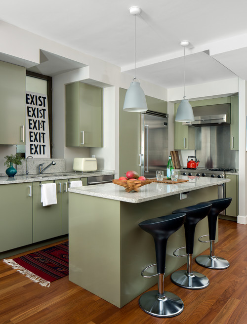 Sage green kitchen cabinets with walnut wood countertop on Craiyon