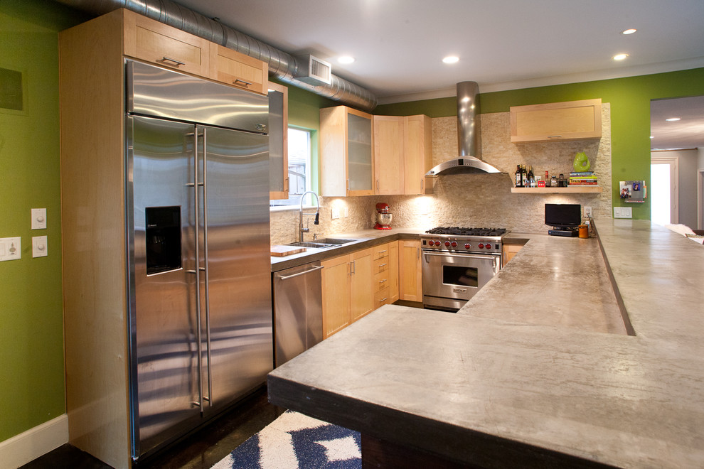 Inspiration for a modern kitchen remodel in Dallas with concrete countertops