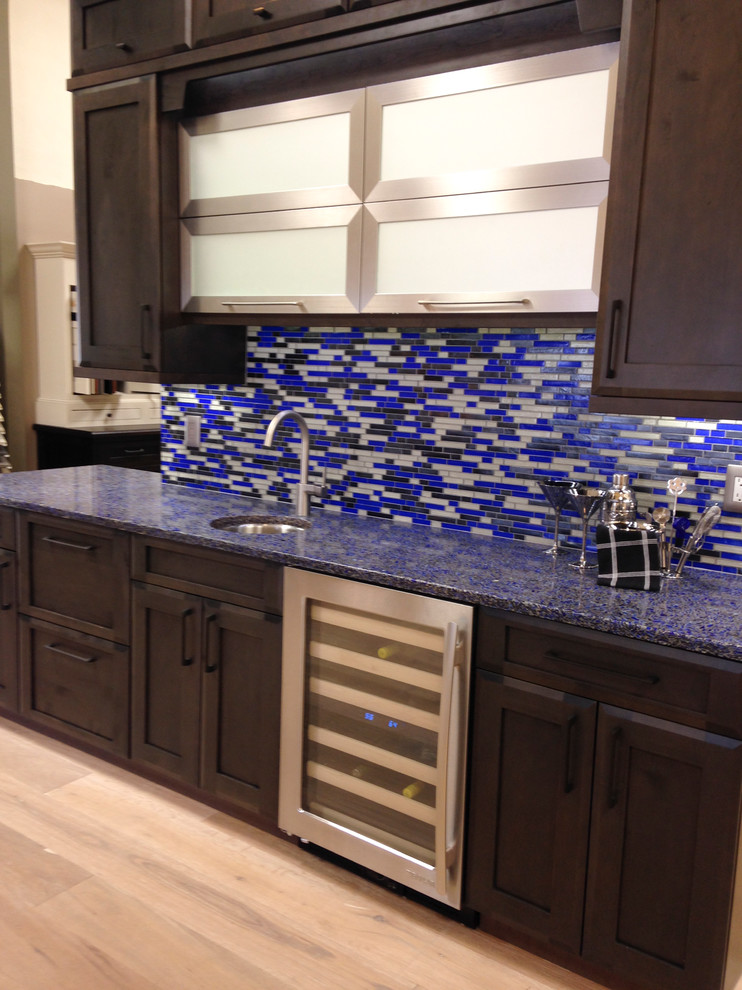 Contemporary kitchen in Miami with a submerged sink, recycled glass countertops, blue splashback and mosaic tiled splashback.