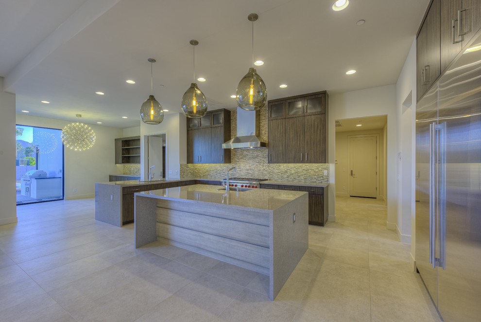 Example of a trendy kitchen design in Phoenix with quartz countertops