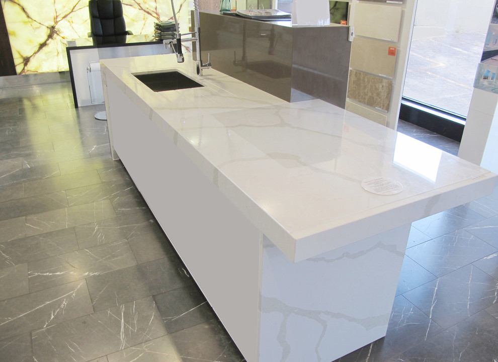 Photo of a contemporary kitchen in Other with engineered stone countertops.