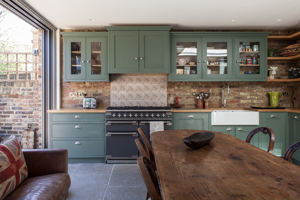 Cottage chic kitchen photo in London