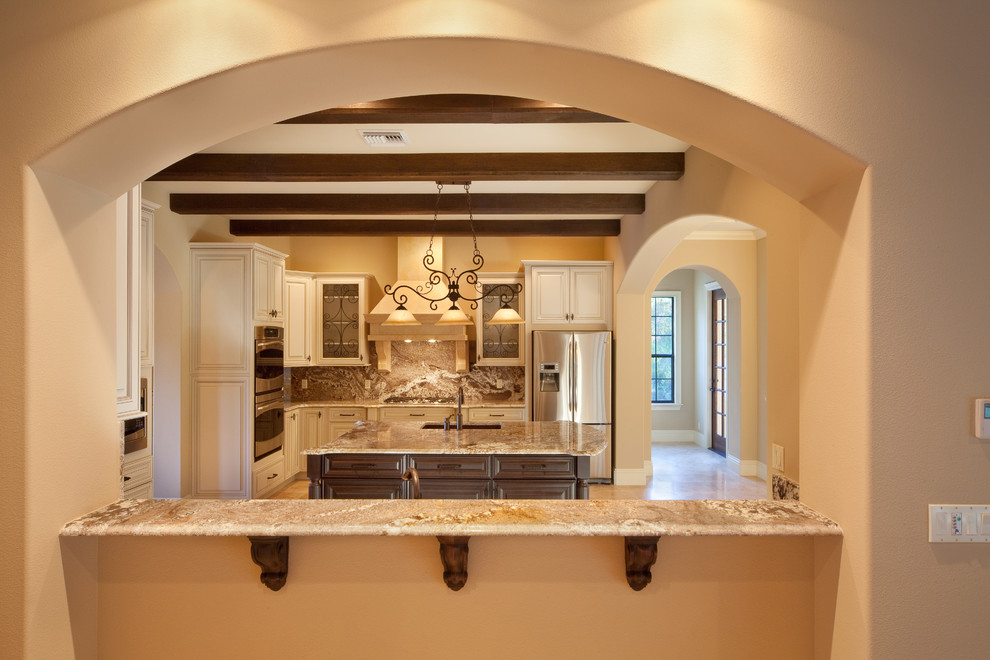 Example of a tuscan kitchen design in Orlando