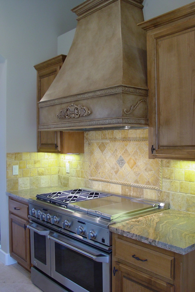 Example of a tuscan kitchen design in Sacramento
