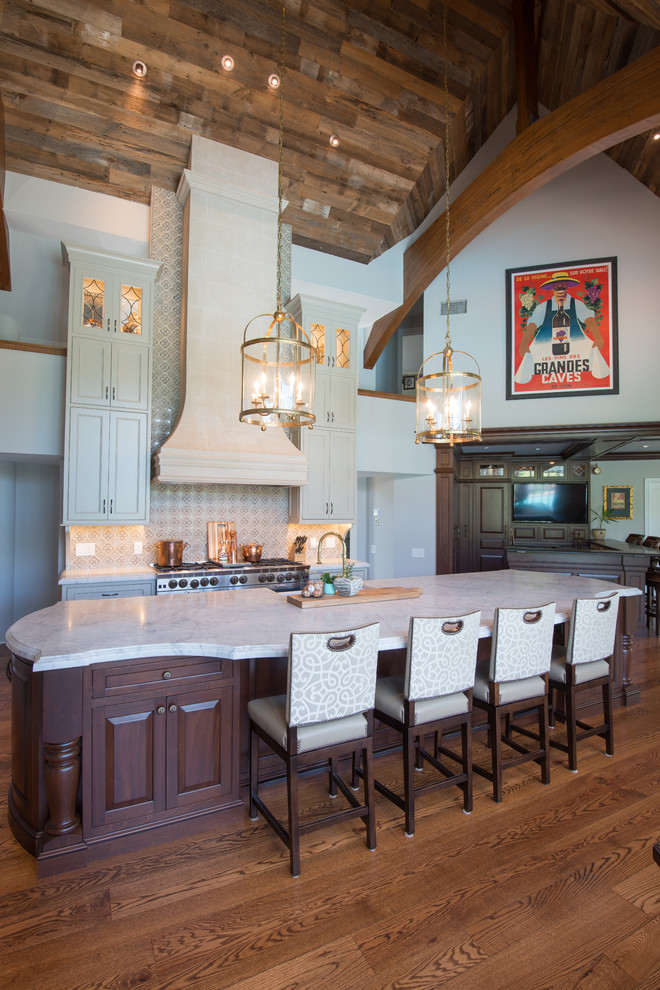 Inspiration for a huge cottage galley medium tone wood floor open concept kitchen remodel in Philadelphia with a farmhouse sink, shaker cabinets, green cabinets, marble countertops, gray backsplash, mosaic tile backsplash, paneled appliances and an island