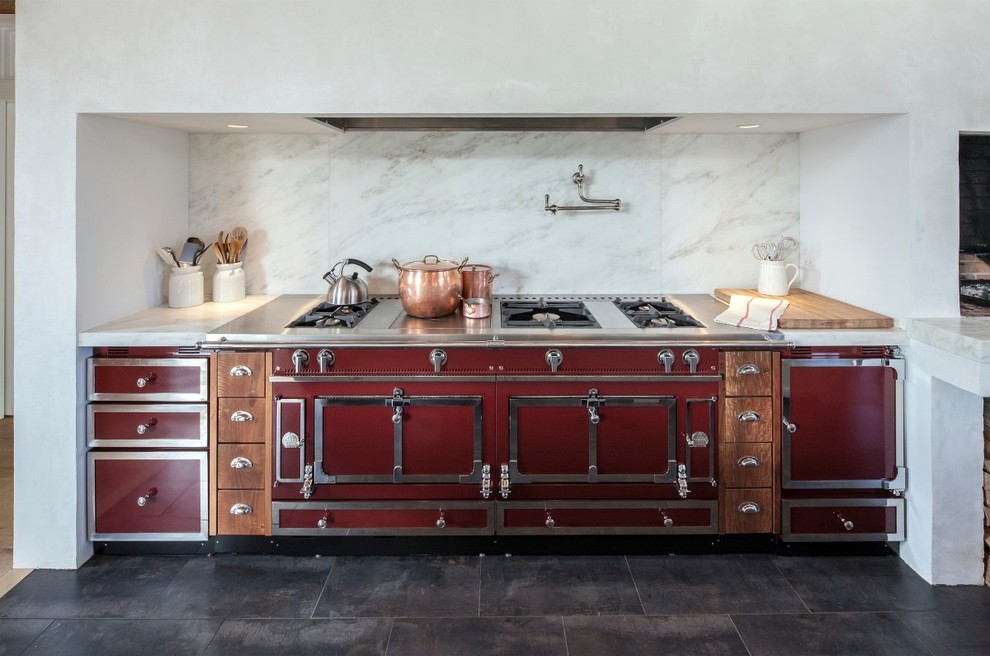 Example of a classic kitchen design in Boston with marble countertops, white backsplash, stone slab backsplash and colored appliances