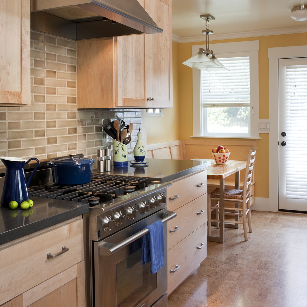 Large elegant galley eat-in kitchen photo in San Francisco with stainless steel appliances, light wood cabinets, an undermount sink, shaker cabinets, granite countertops, beige backsplash, subway tile backsplash and no island