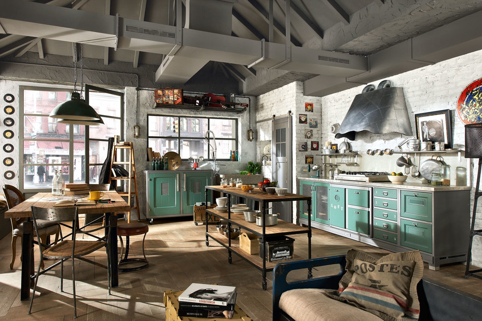 Offene, Mittelgroße Industrial Küche in L-Form mit grünen Schränken, Marmor-Arbeitsplatte und Vinylboden in Sonstige