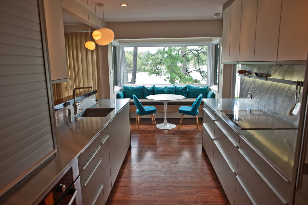 Design ideas for a contemporary kitchen in Bridgeport with integrated appliances.