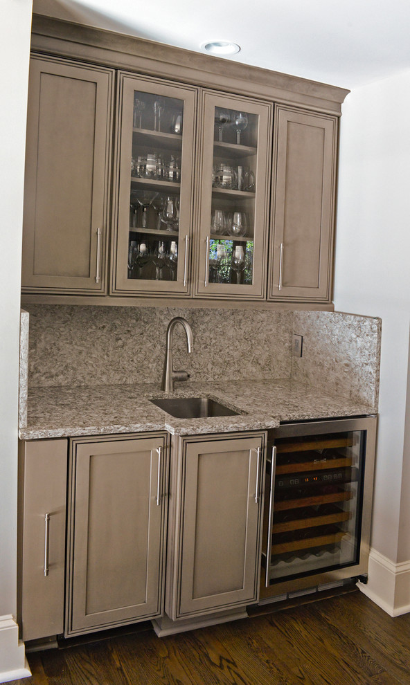 Inspiration for a modern kitchen remodel in Atlanta with quartz countertops and an island