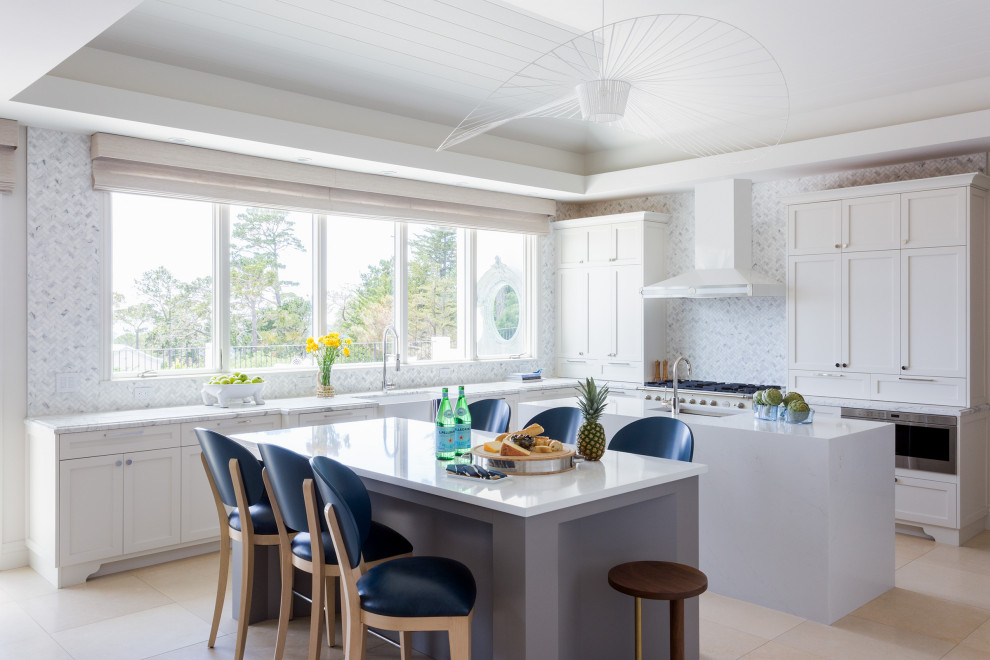 Example of a huge trendy l-shaped beige floor and shiplap ceiling kitchen design in Houston with a farmhouse sink, stainless steel appliances, two islands, shaker cabinets, white cabinets, multicolored backsplash and white countertops