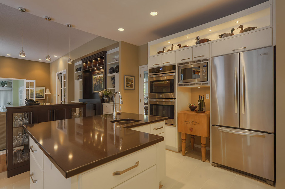Example of a trendy kitchen design in Vancouver with stainless steel appliances